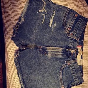 Levi’s 501 distressed high waisted shorts